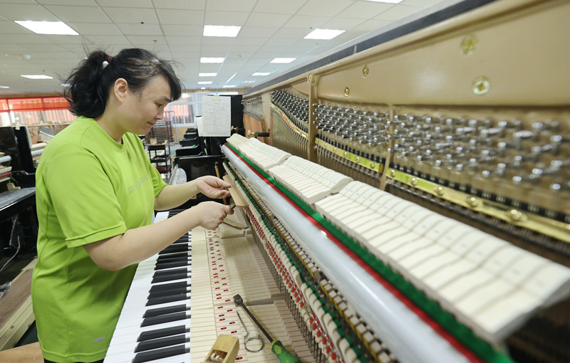 Пианино из поселка Китая экспортируется в более чем 20 стран мира