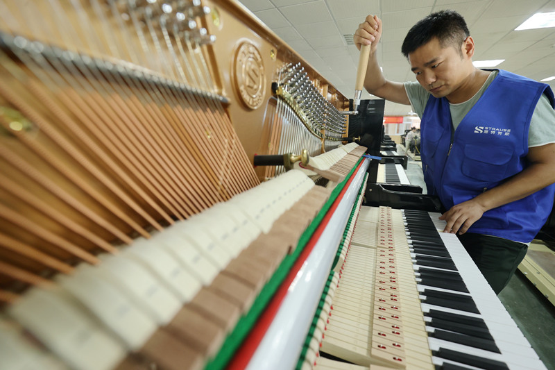 Пианино из поселка Китая экспортируется в более чем 20 стран мира